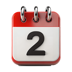 a red desk calendar displaying number 2